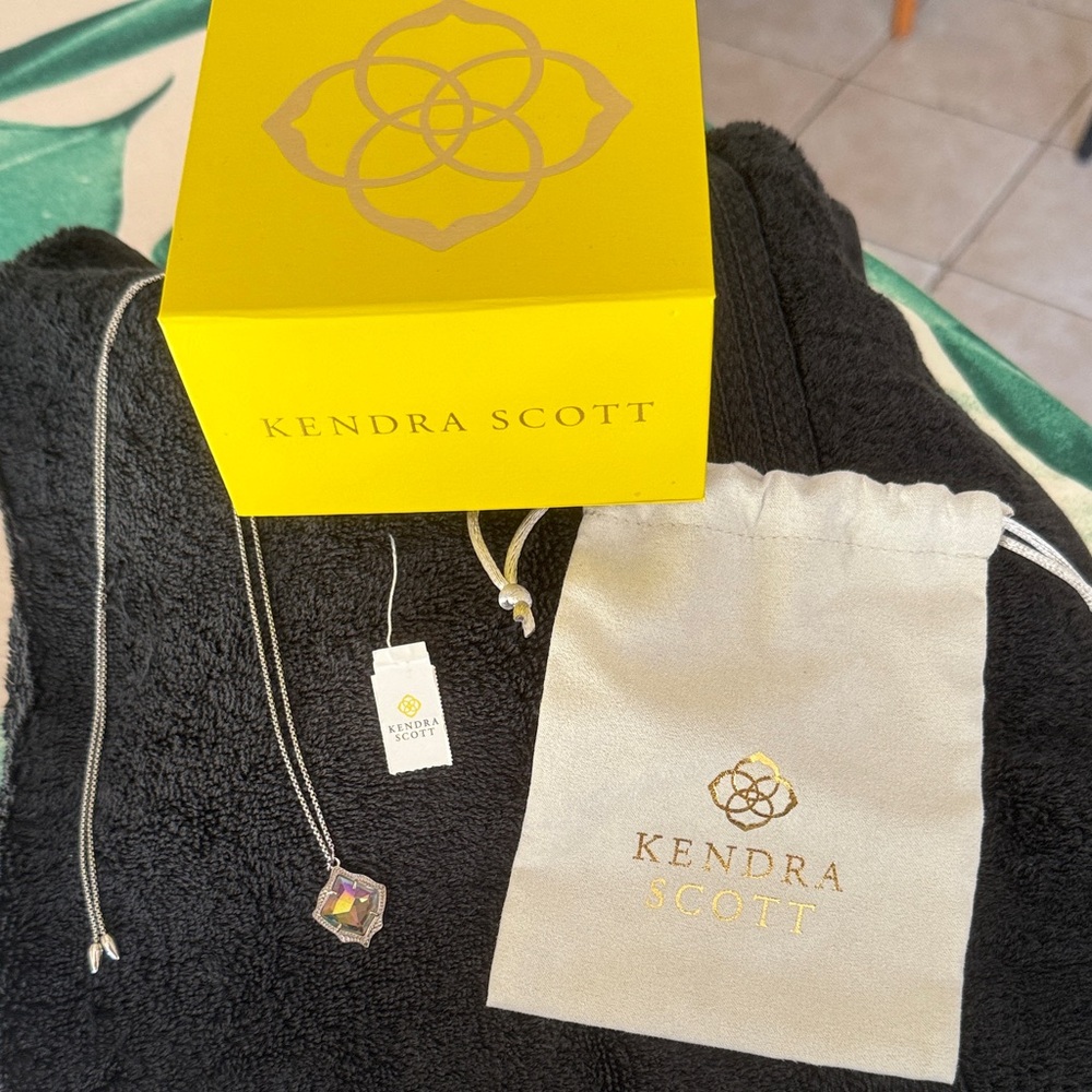 Kendra Scott Necklace adjustable to 28”. NWT. Stone is a multi colored crystal.
